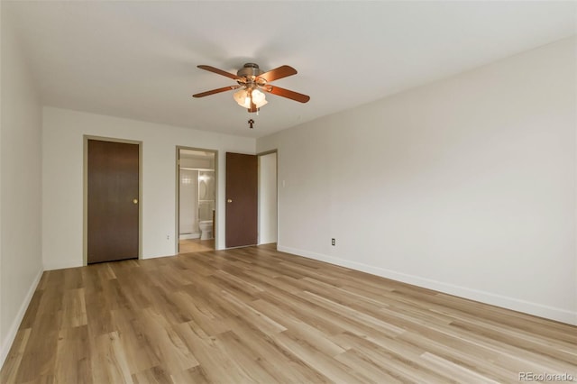 13606 E Bates Ave Unit 304, Aurora, CO 80014 - unfurnished bedroom with light wood-style floors, baseboards, ensuite bath, and ceiling fan