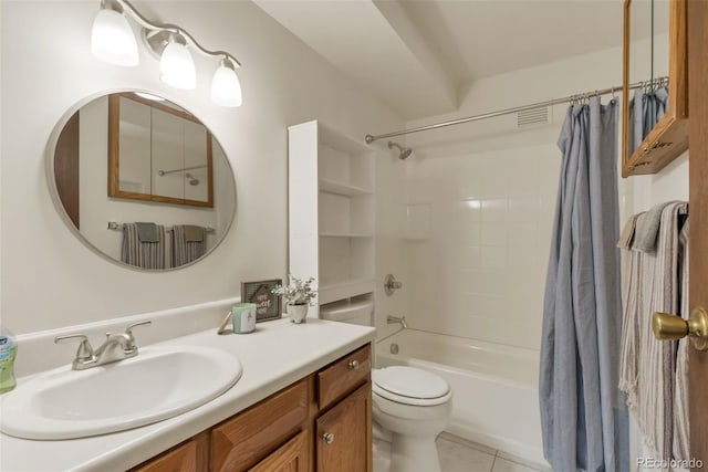 13606 E Bates Ave Unit 304, Aurora, CO 80014 - bathroom with shower / bath combination with curtain, toilet, vanity, and tile patterned flooring