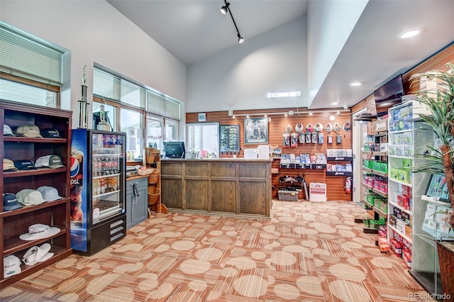 13606 E Bates Ave Unit 304, Aurora, CO 80014 - office with high vaulted ceiling, rail lighting, and light colored carpet
