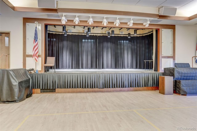 13606 E Bates Ave Unit 304, Aurora, CO 80014 - miscellaneous room with rail lighting and wood finished floors
