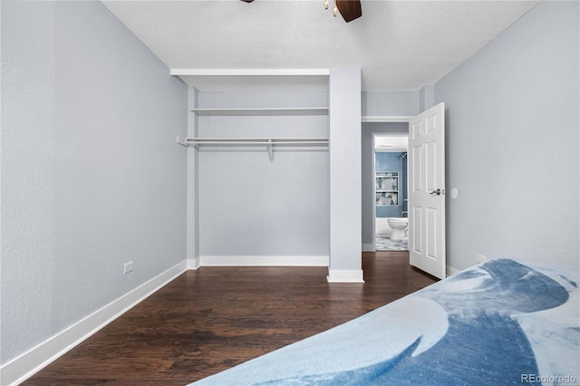 2281 Vaughn Unit 104A, Aurora, CO 80014 - bedroom with wood finished floors, baseboards, ceiling fan, a textured ceiling, and a closet