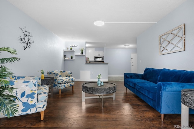 2281 Vaughn Unit 104A, Aurora, CO 80014 - living room with wood finished floors and baseboards