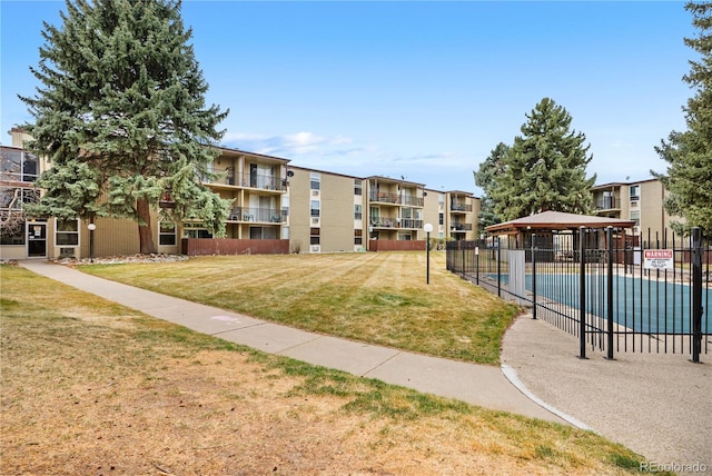 2281 Vaughn Unit 104A, Aurora, CO 80014 - view of home's community featuring a gazebo, a swimming pool, and a residential view