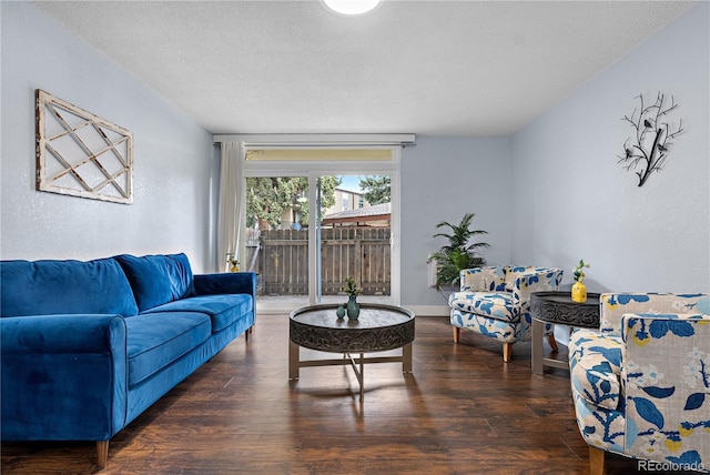 2281 Vaughn Unit 104A, Aurora, CO 80014 - living room with wood finished floors and a textured ceiling