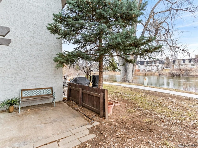 view of yard with a water view