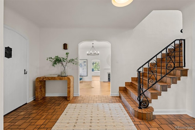 entrance foyer with a notable chandelier