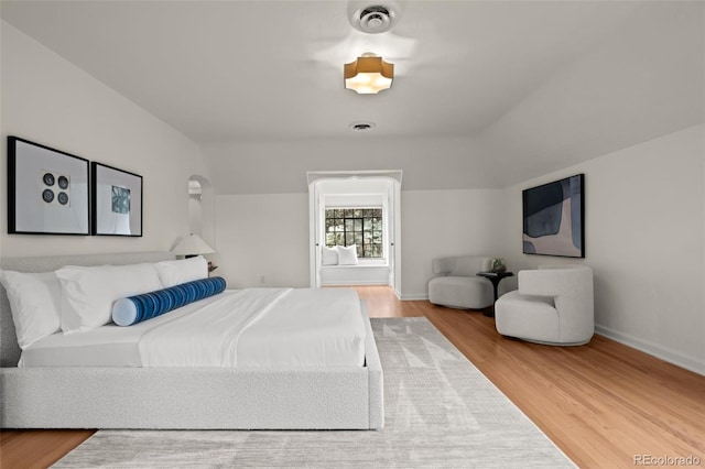 bedroom featuring wood-type flooring