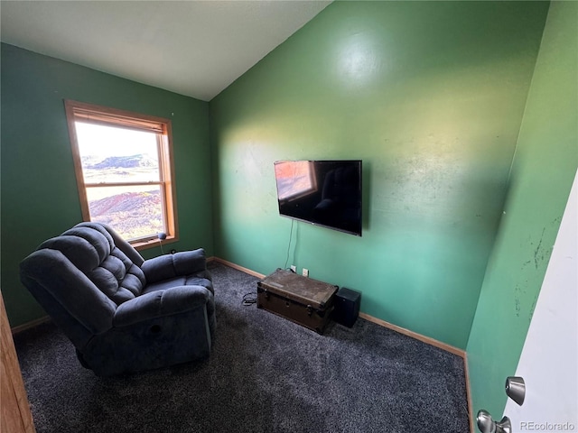 carpeted living room with vaulted ceiling