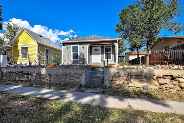 228 E Las Vegas St, Colorado Springs, CO 80903 - view of front of property with a gate and a fenced front yard