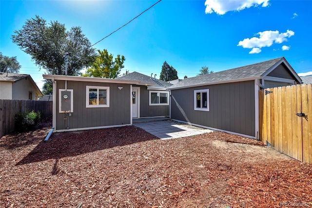 228 E Las Vegas St, Colorado Springs, CO 80903 - view of front of property with a patio and roof with shingles