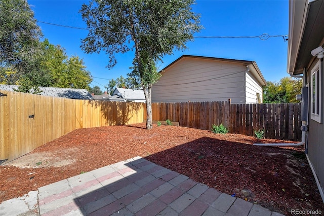 228 E Las Vegas St, Colorado Springs, CO 80903 - fenced backyard featuring a patio