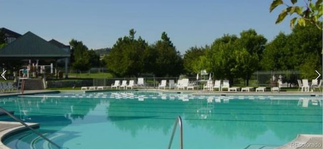 community pool with fence