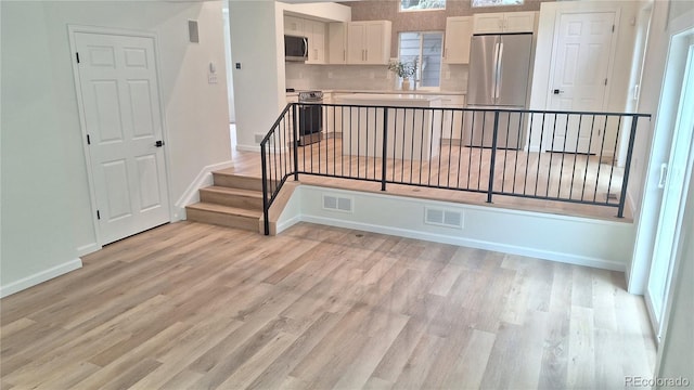10538 Tiger Chase, Lone Tree, CO 80124 - interior space featuring wood finished floors and baseboards