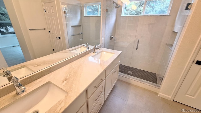 10538 Tiger Chase, Lone Tree, CO 80124 - bathroom featuring a stall shower, double vanity, and tile patterned flooring
