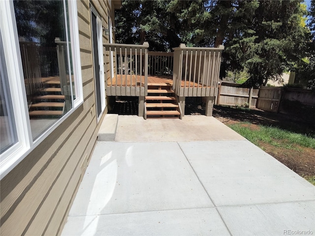 10538 Tiger Chase, Lone Tree, CO 80124 - deck featuring stairway and a patio area