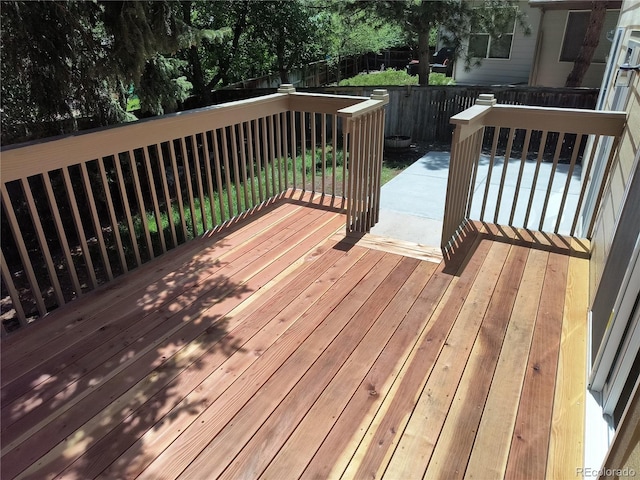 10538 Tiger Chase, Lone Tree, CO 80124 - wooden terrace featuring a fenced backyard