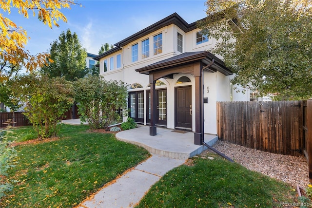 view of front of home with a front yard