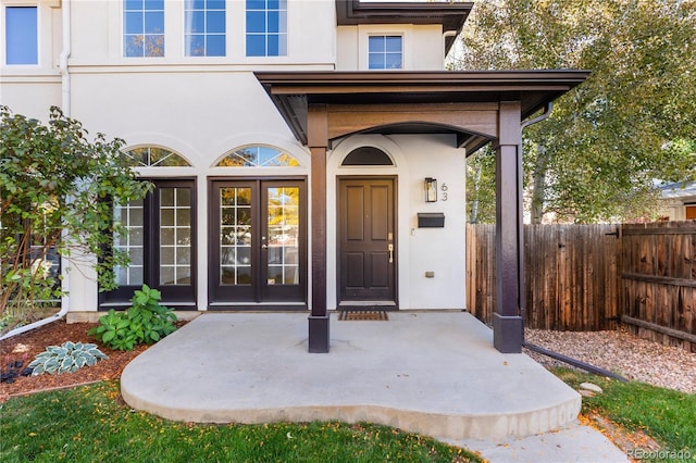 doorway to property featuring french doors