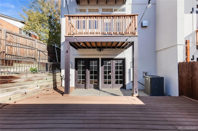 deck with central AC and french doors