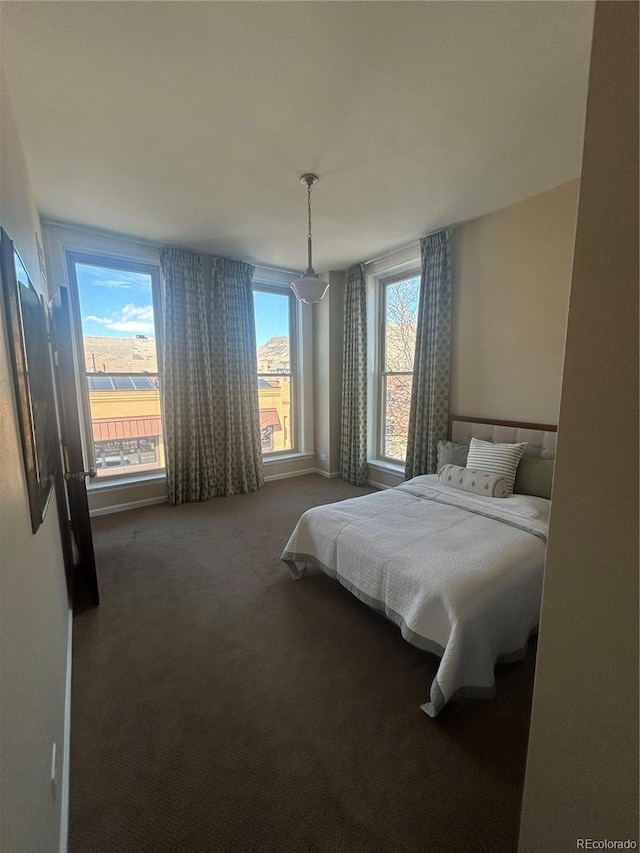 bedroom featuring carpet