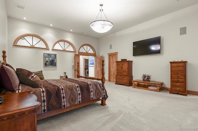 carpeted bedroom with baseboards, visible vents, and recessed lighting