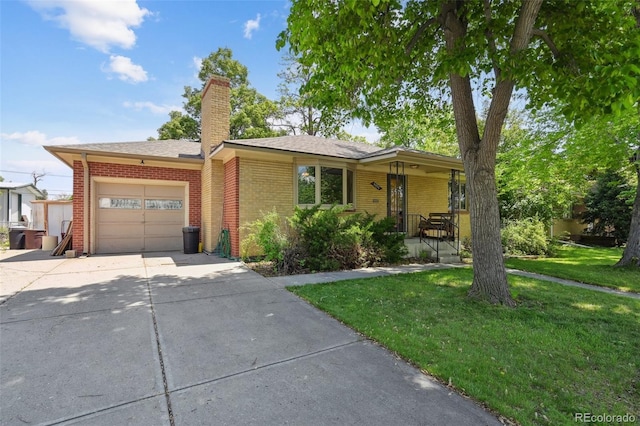 6050 Marshall Ct, Arvada, CO 80003 - ranch-style house featuring a garage, driveway, a front yard, and a chimney