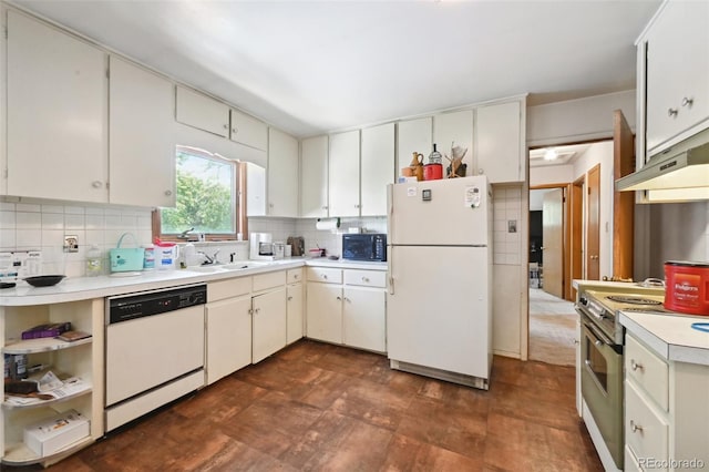 6050 Marshall Ct, Arvada, CO 80003 - kitchen with white appliances, light countertops, tasteful backsplash, a sink, and dark flooring