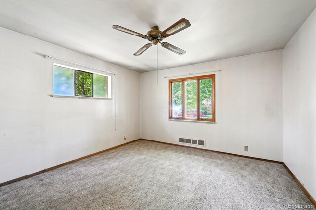 6050 Marshall Ct, Arvada, CO 80003 - spare room with carpet floors, ceiling fan, and baseboards