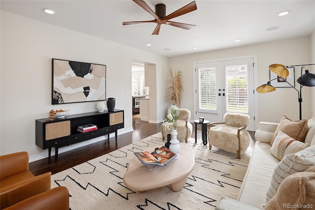 living room featuring recessed lighting, baseboards, a ceiling fan, and wood finished floors