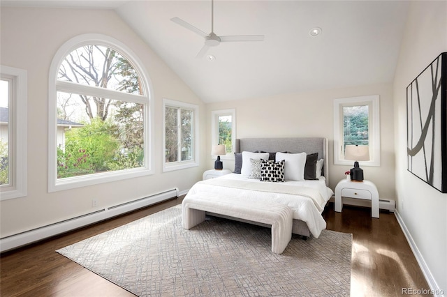 bedroom featuring a ceiling fan, lofted ceiling, dark wood-style floors, and baseboard heating
