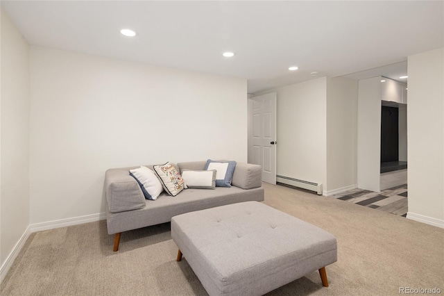 living room with baseboards, a baseboard radiator, recessed lighting, and light colored carpet