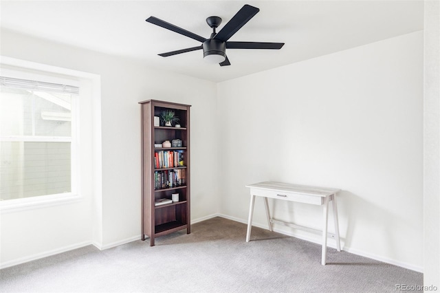 misc room with ceiling fan and carpet