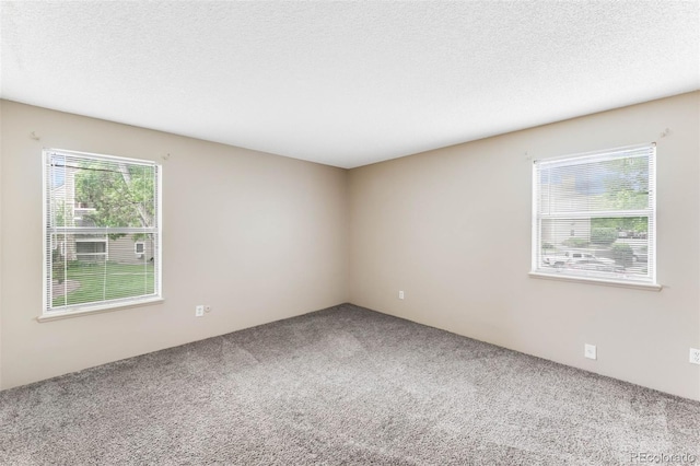 4896 S Dudley St Unit 4-7, Littleton, CO 80123 - carpeted spare room with a textured ceiling