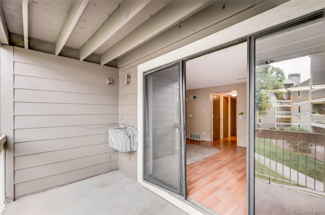 4896 S Dudley St Unit 4-7, Littleton, CO 80123 - view of exterior entry with a balcony