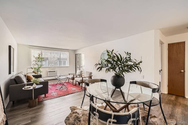 dining area with wood finished floors