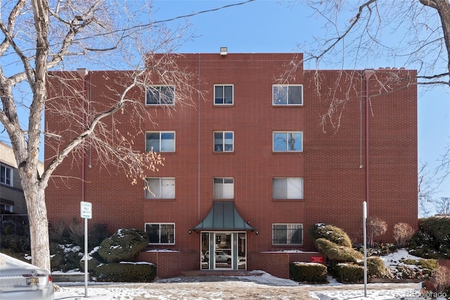 view of snow covered building