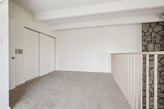 384 S Ironton St Unit 413, Aurora, CO 80012 - carpeted spare room with beam ceiling