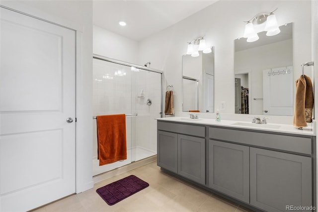 bathroom with vanity and walk in shower