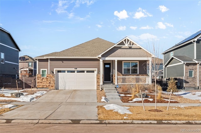 craftsman-style home featuring a porch and a garage