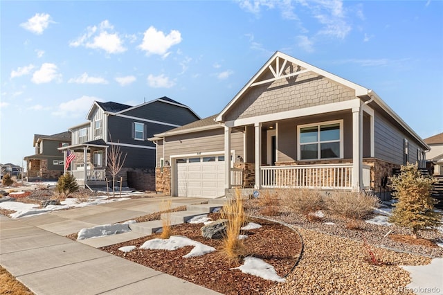 craftsman inspired home with a porch and a garage