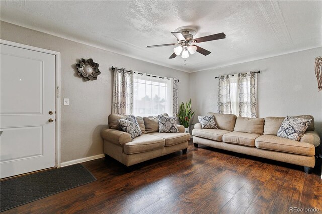 5910 Glencoe St, Commerce City, CO 80022 - living area featuring a ceiling fan, baseboards, a textured ceiling, and wood finished floors