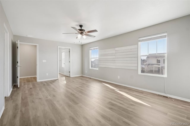 unfurnished bedroom with light hardwood / wood-style floors and ceiling fan