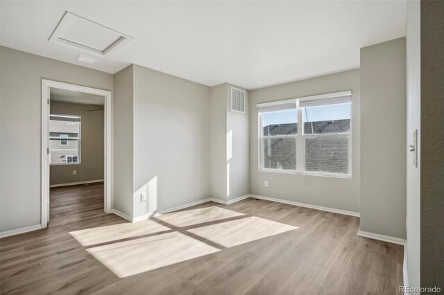 empty room with light wood-type flooring