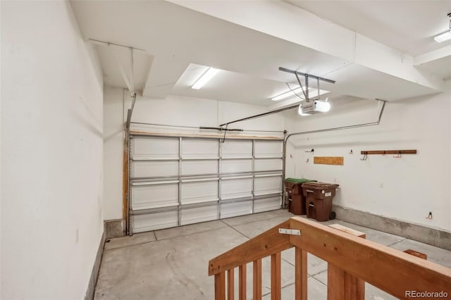 garage featuring a garage door opener