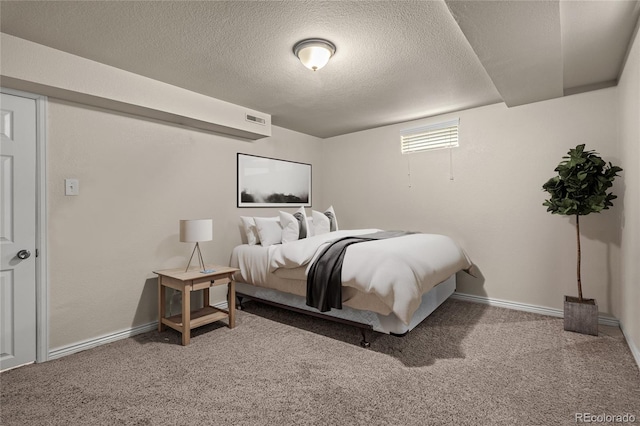 2907 Pennsylvania Ave, Colorado Springs, CO 80907 - bedroom with carpet floors, a textured ceiling, and baseboards