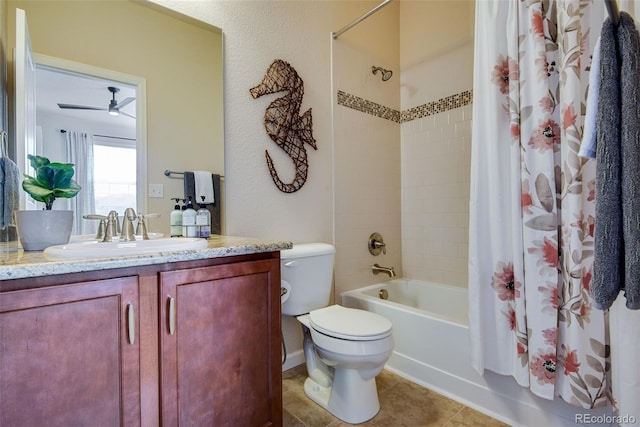 full bathroom featuring toilet, vanity, tile patterned floors, ceiling fan, and shower / bathtub combination with curtain
