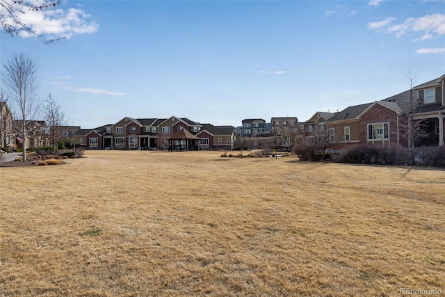 view of yard with a residential view