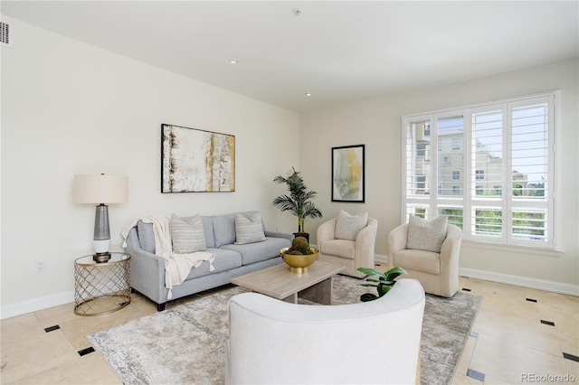 2500 E Cherry Creek S Drive 306, Denver, CO 80209 - tiled living room featuring baseboards and recessed lighting