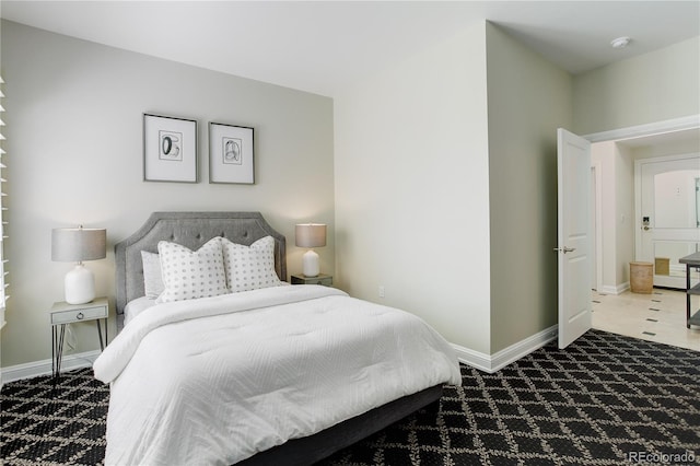 2500 E Cherry Creek S Drive 306, Denver, CO 80209 - carpeted bedroom featuring baseboards