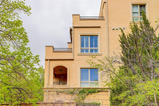 2500 E Cherry Creek S Drive 306, Denver, CO 80209 - view of front of home featuring stucco siding